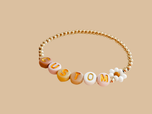 EZRA | colorful name bracelet with daisy