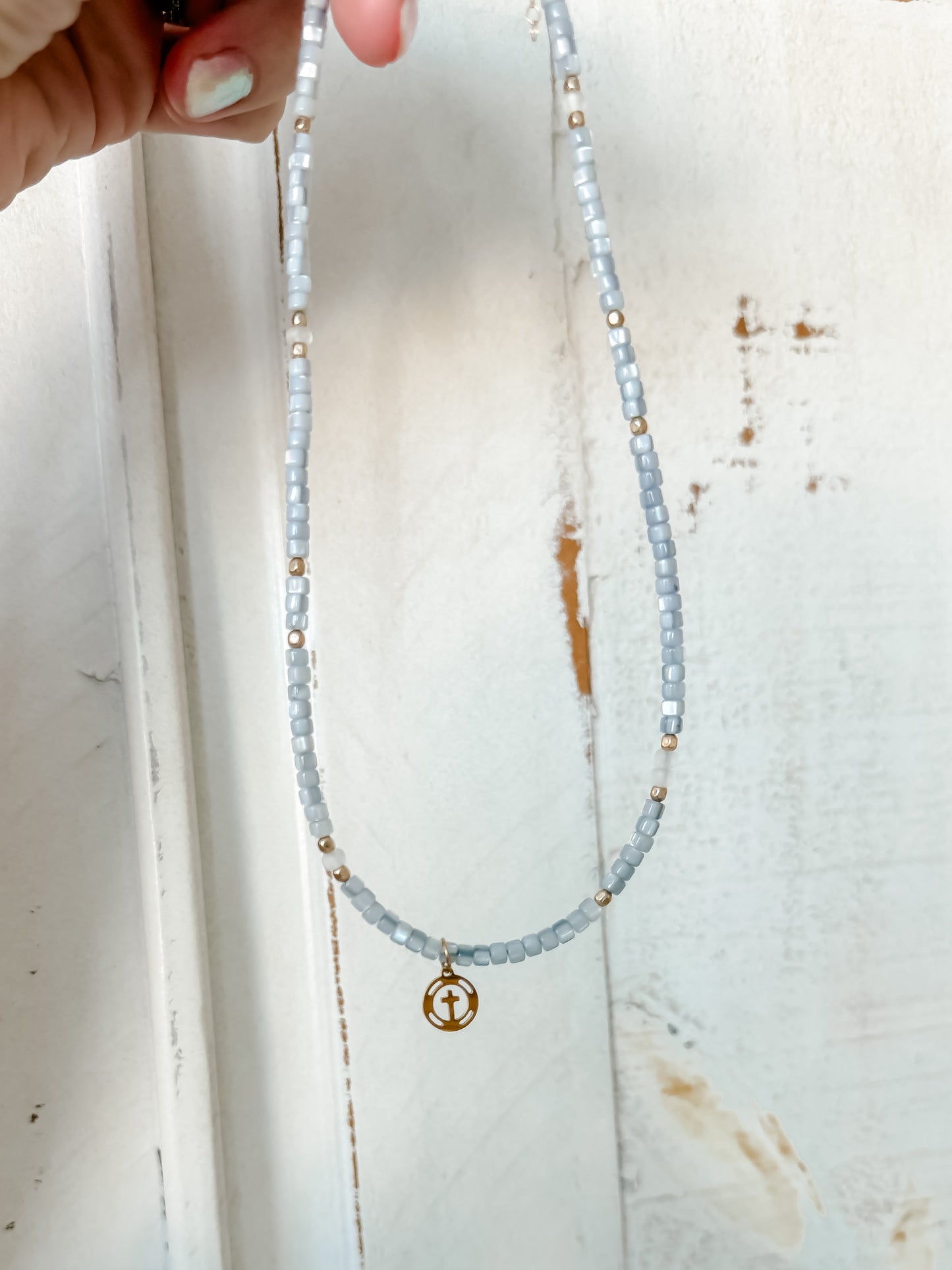 ESTHER | beaded necklace with gold filled accent beads and stainless steel cross charm